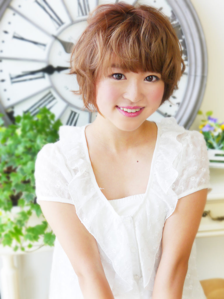 ヘアジュレドゥのパーマをかけたショートヘアの写真