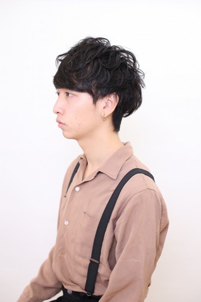 柔らかパーマがマイルド感を演出している爽やか男子