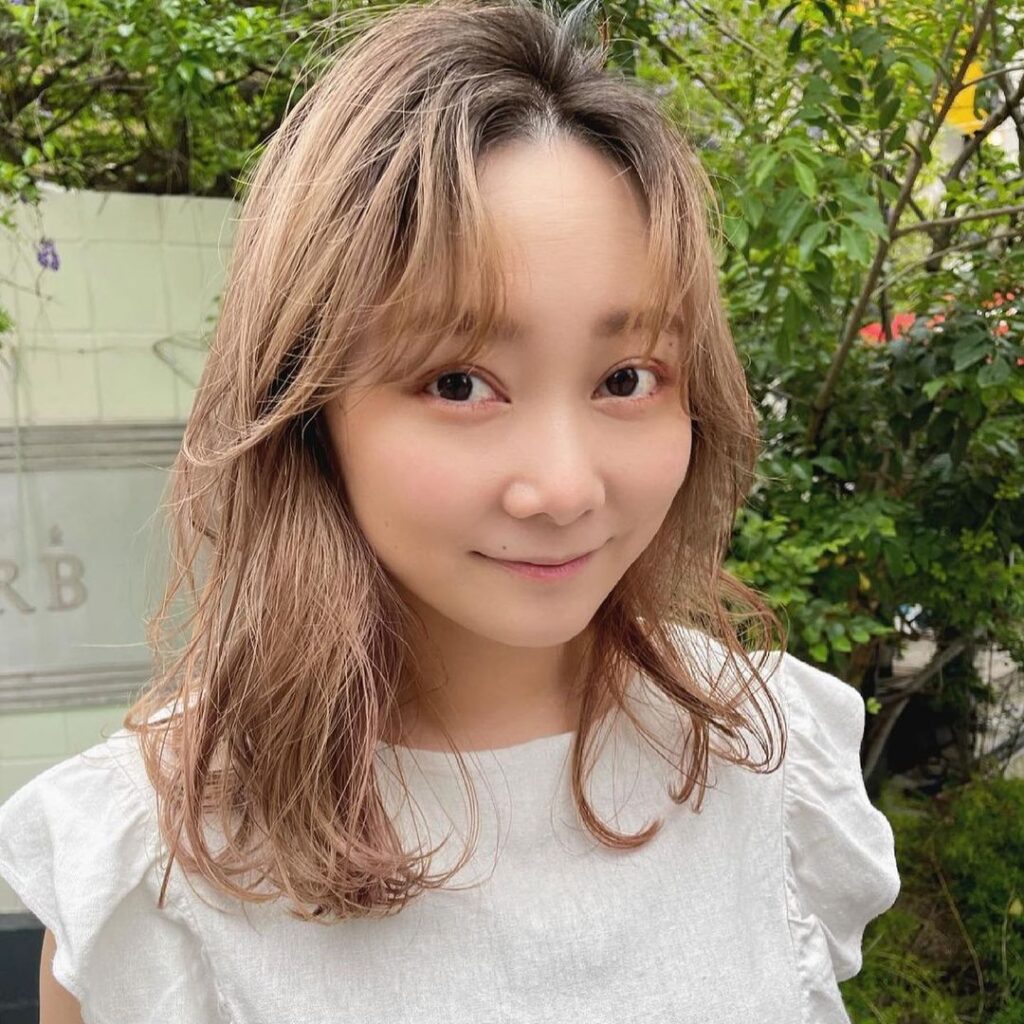 ルッカのパーマをかけた女性の写真