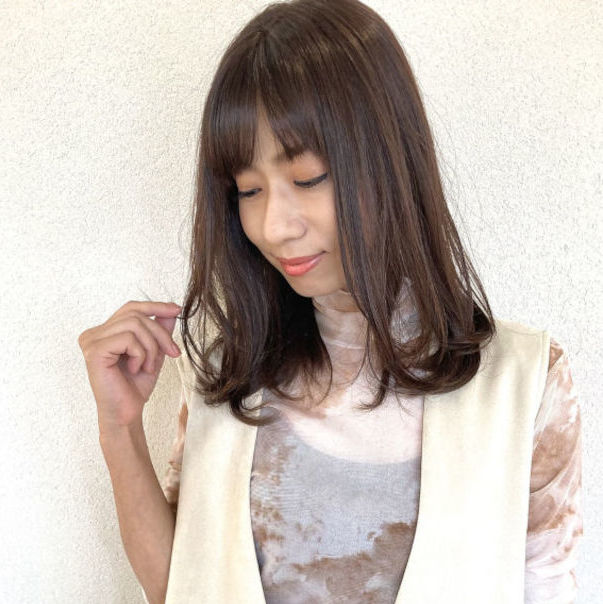 el zafiro 肥後橋店 ナチュラルなロングスタイルの女性の写真